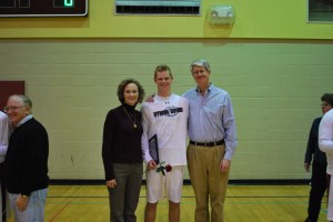 Senior Max Sosland and his parents pose for a congratulatory photo after the ceremony.