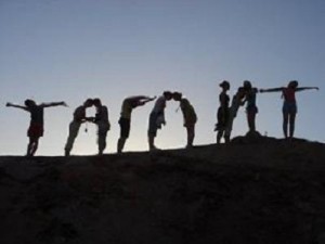 Photo courtesy of Wikimedia Commons. Jewish young adults on Birthright spell out "Taglit" using their bodies.