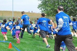 Photo by Julia Paul. HBHA students and teachers race against each other in the first leg of the Fun Run.