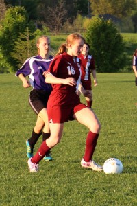 Freshman Molly Kavanaugh speeds past the defender and goes in for the goal. Photo provided by Alexis Davis.