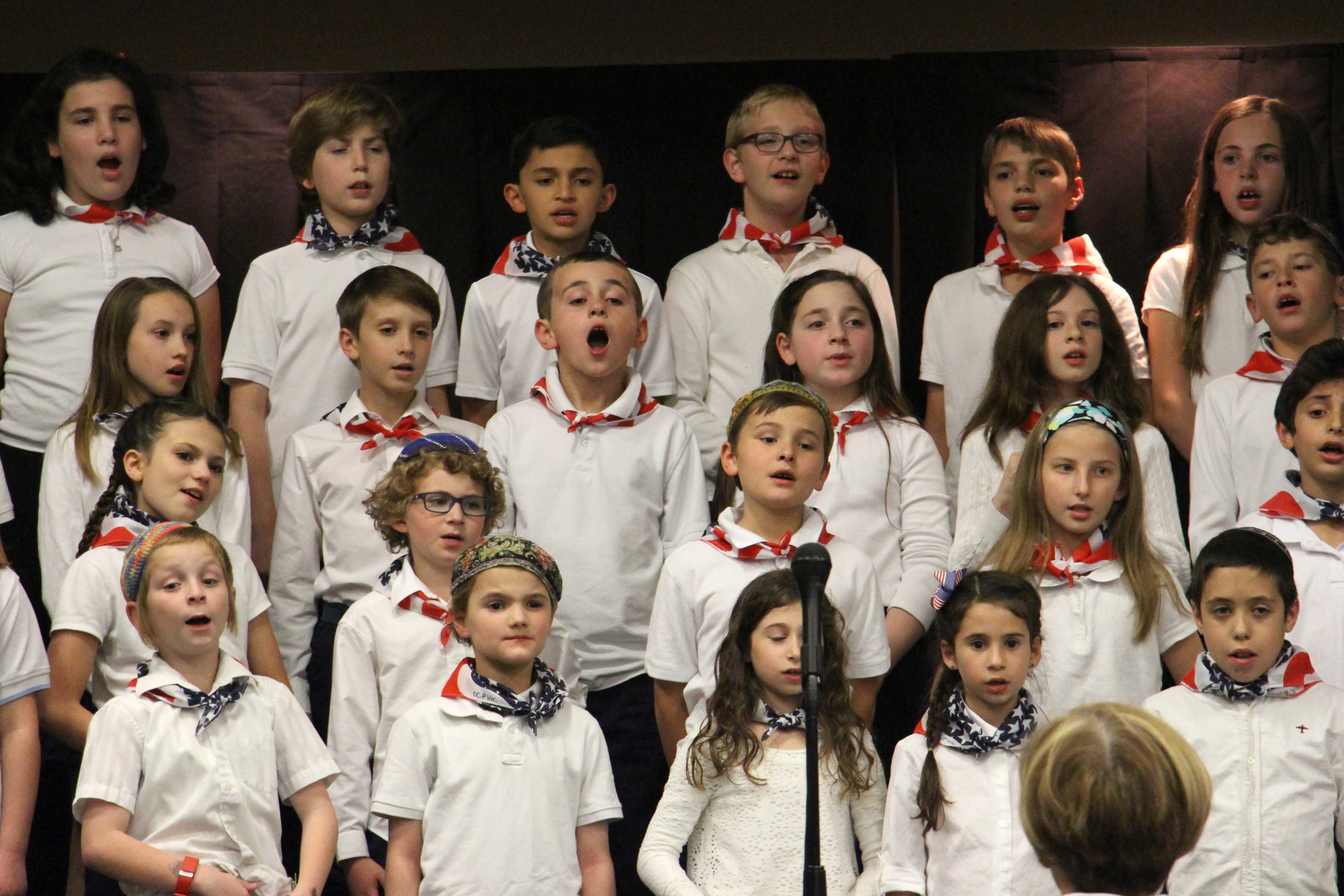 Fourth and fifth graders showed off their knowledge though song at the beginning of State Fair. Photo by Debi Davis.